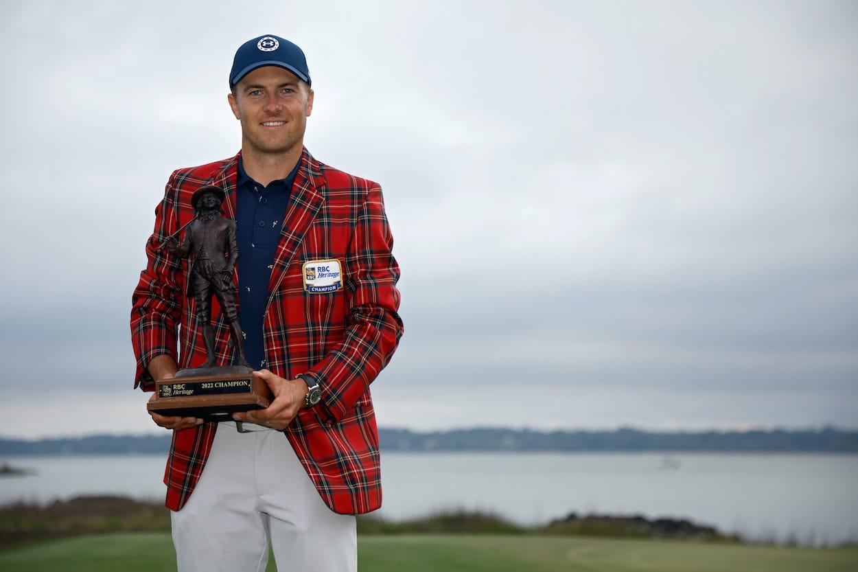 Jordan Spieth poses with the RBC Heritage trophy.