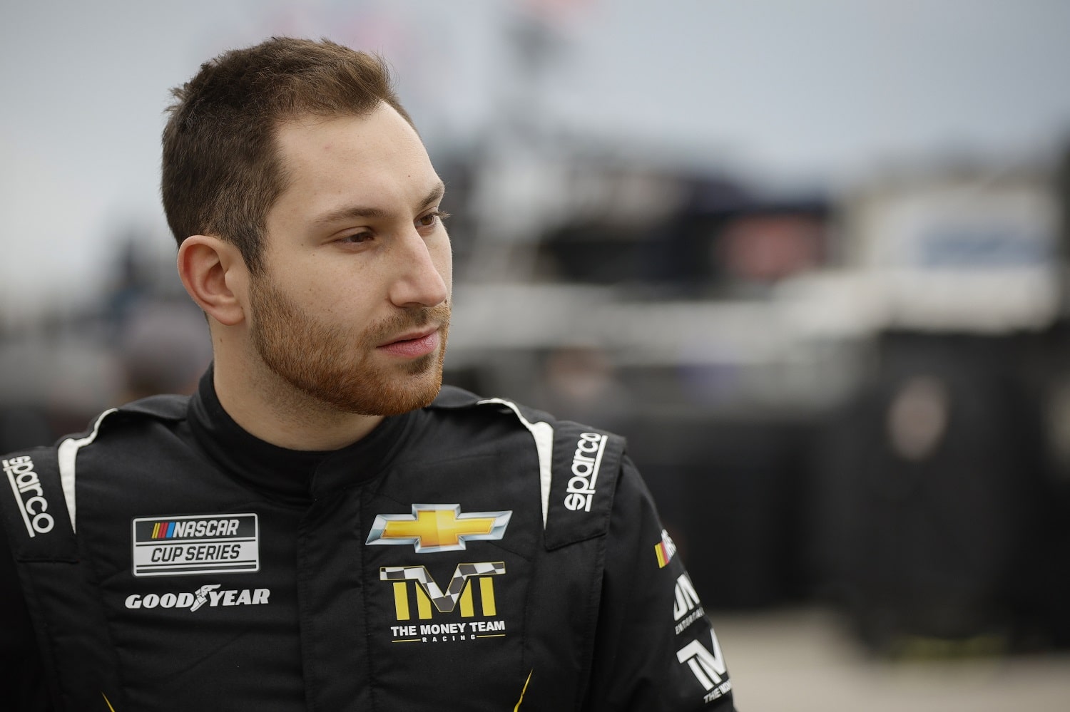 Kaz Grala walks the garage area during practice for the 64th Daytona 500 on Feb. 19, 2022.