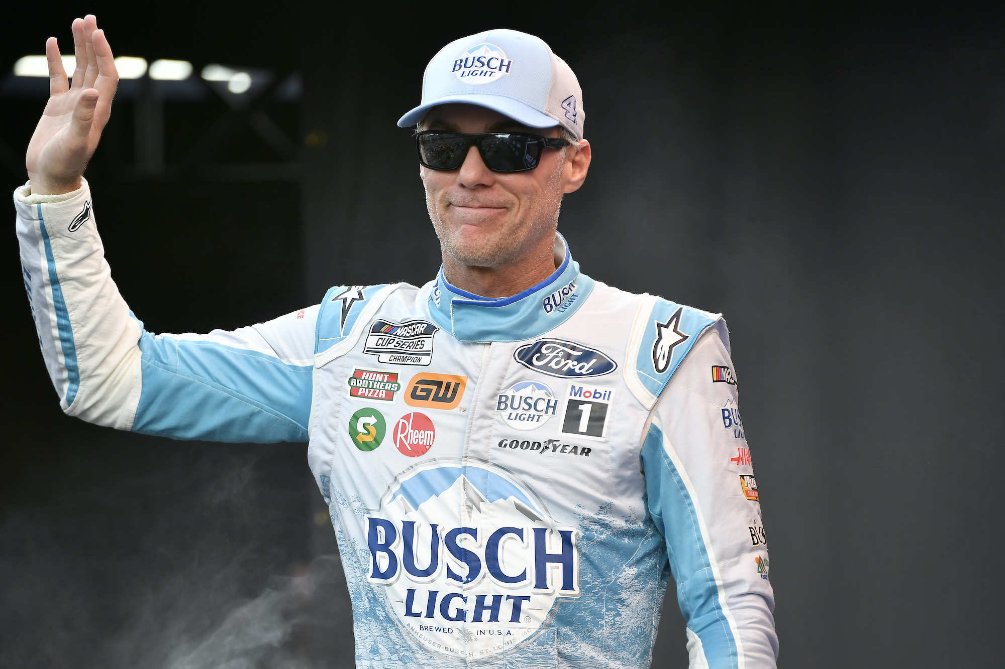 Kevin Harvick waves to crowd