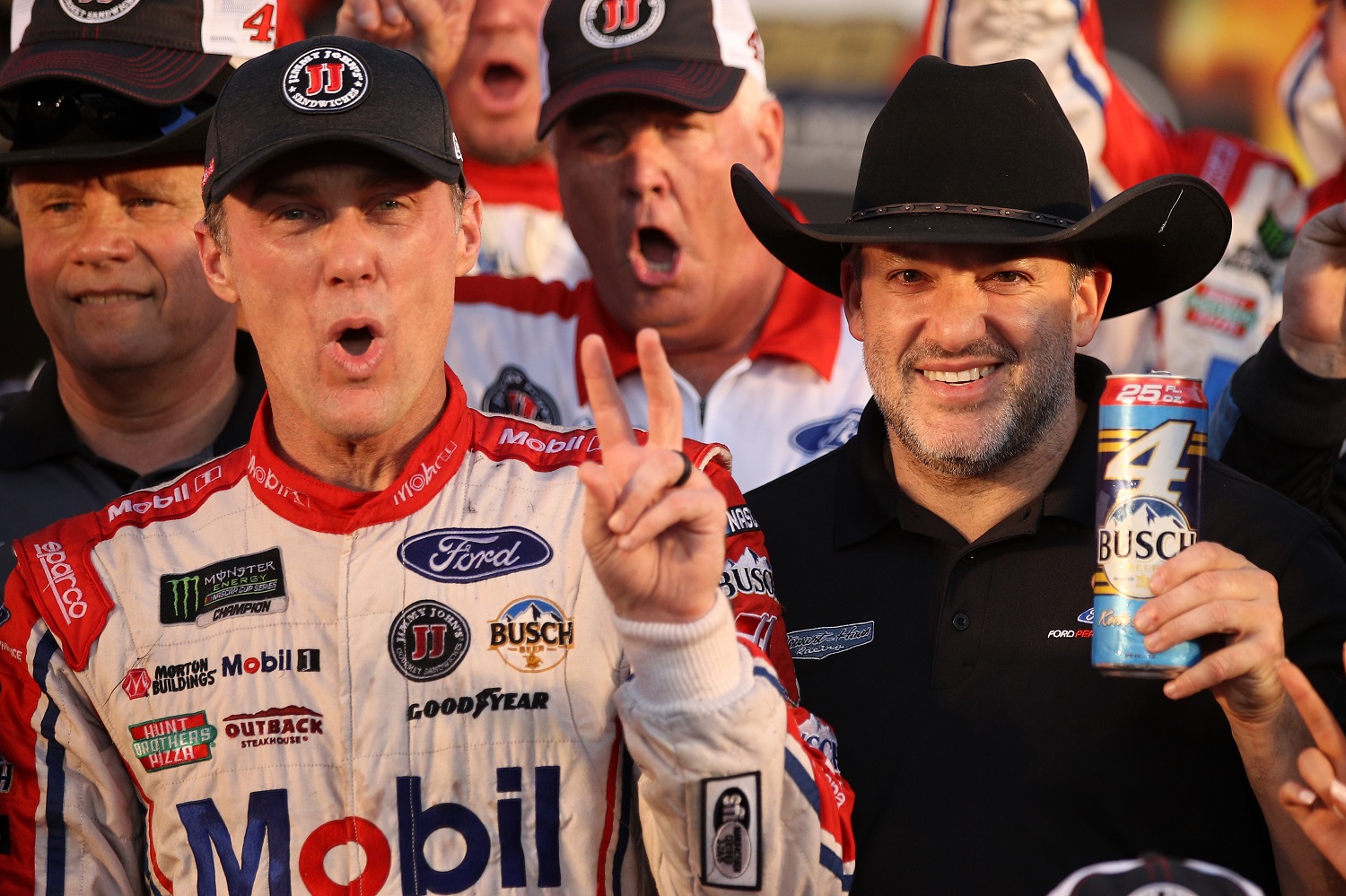 Kevin Harvick and Tony Stewart celebrate in Victory Lane after Harvick won the AAA Texas 500 at Texas Motor Speedway on Nov. 5, 2017.