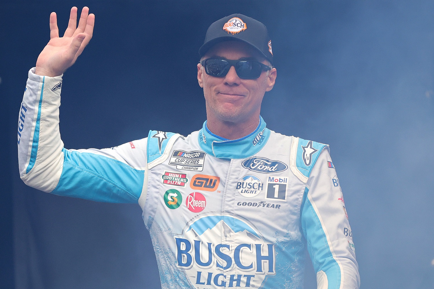Kevin Harvick waves to fans during driver intros prior to the NASCAR Cup Series Xfinity 500 at Martinsville Speedway on Oct. 30, 2022.