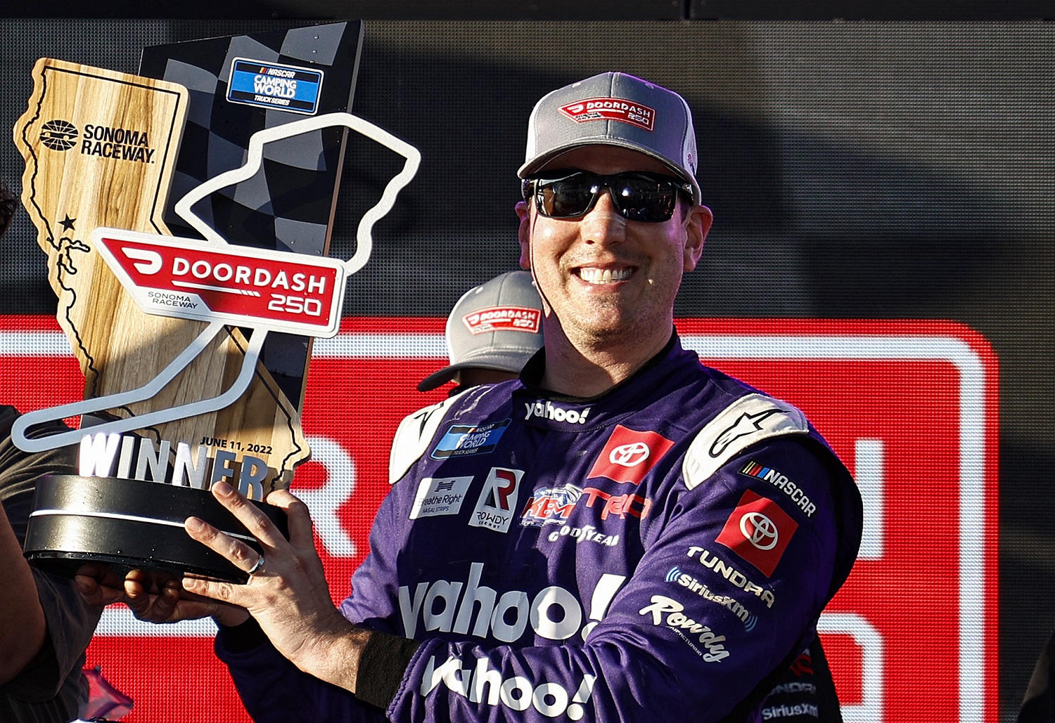 Kyle Busch celebrates in victory lane after winning the NASCAR Camping World Truck Series DoorDash 250 at Sonoma Raceway on June 11, 2022.