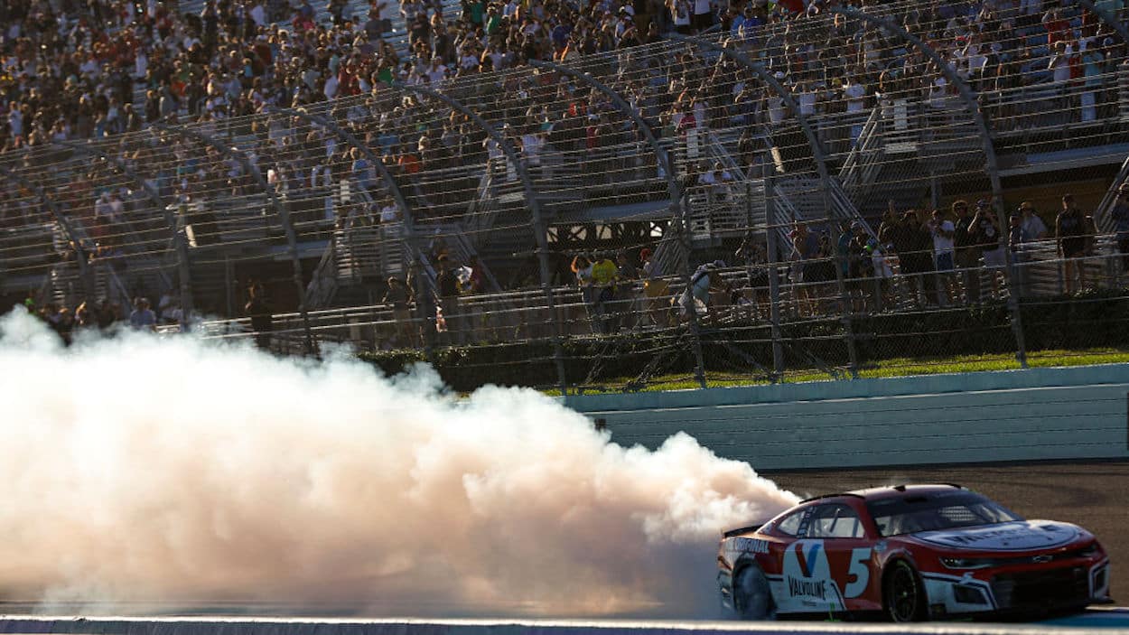 Kyle Larson celebrates victory at the ASCAR Cup Series Dixie Vodka 400.