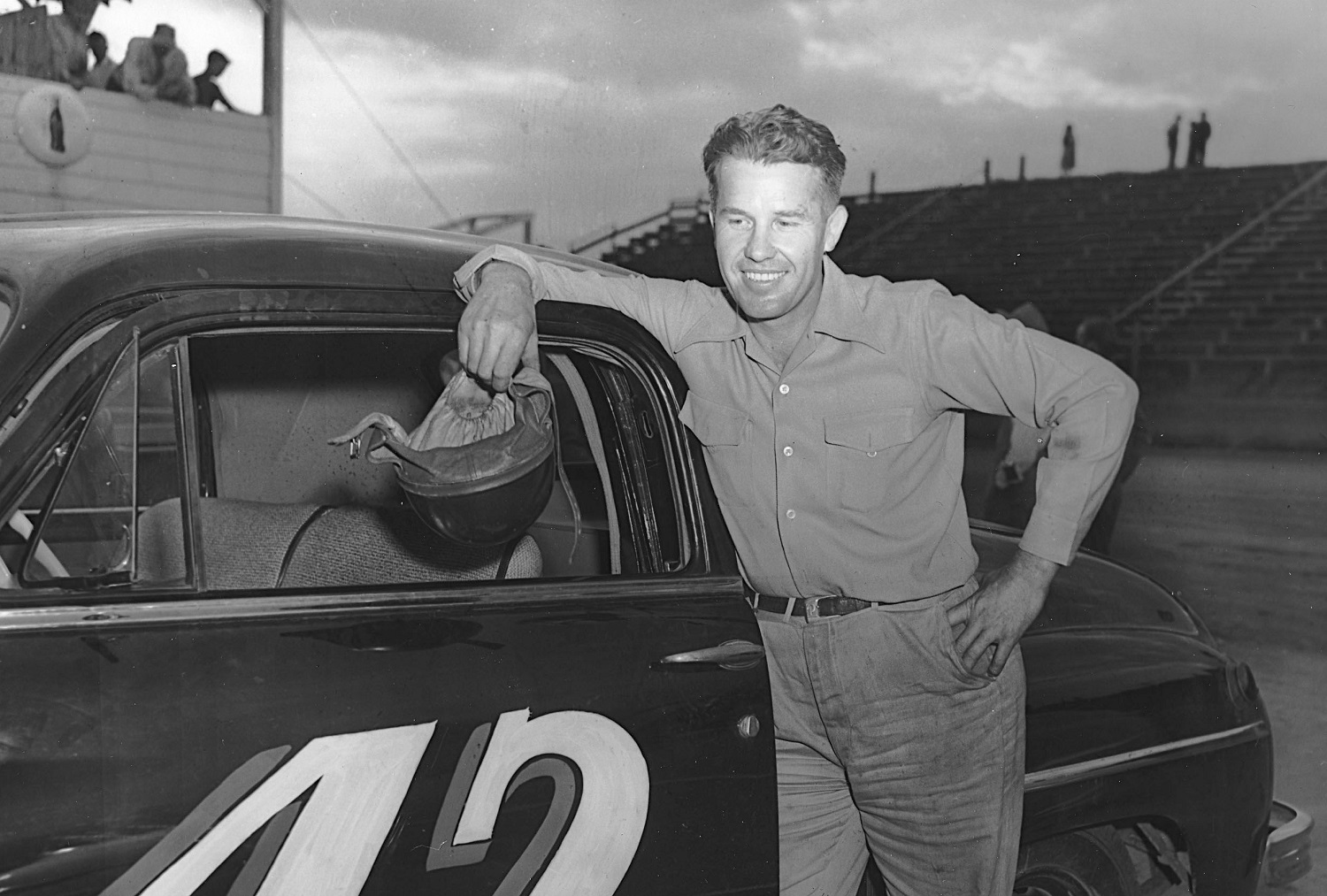 Lee Petty poses next to his car before a race circa 1949. | ISC Archives/CQ-Roll Call Group via Getty Images