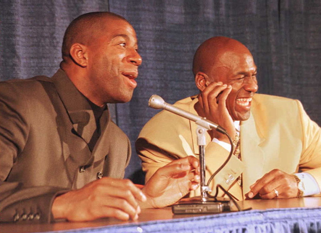 Magic Johnson (L) and Michael Jordan (R) during a 1996 press conference.