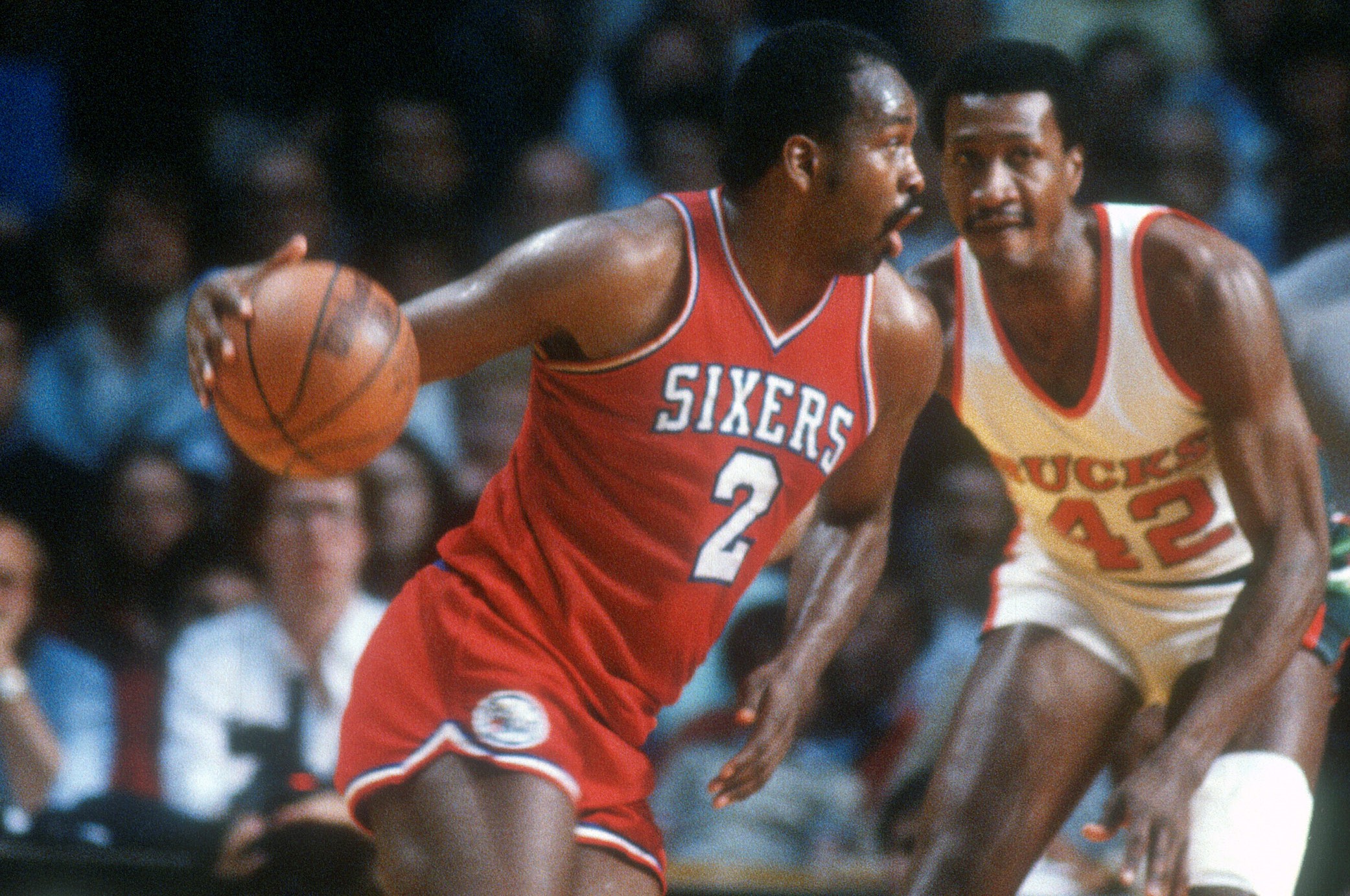 Moses Malone of the Philadelphia 76ers drives to the basket.