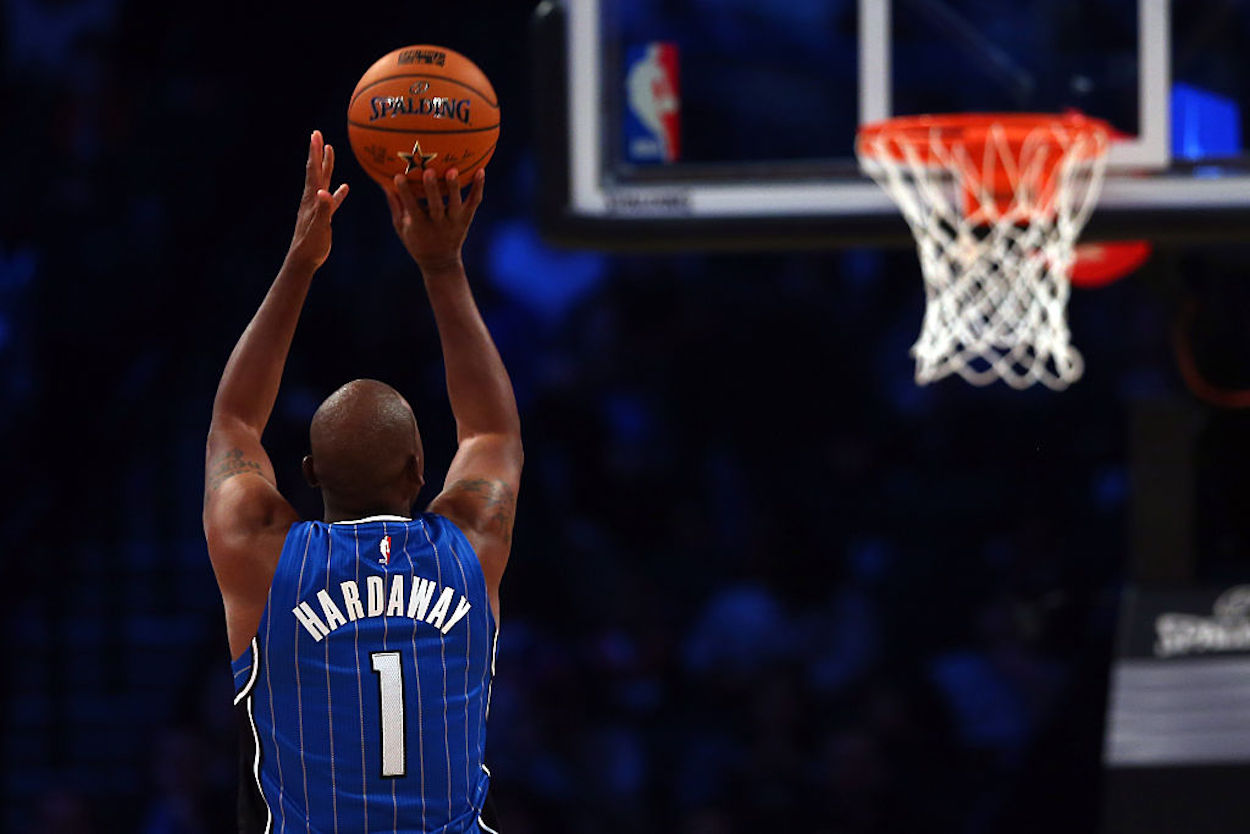 Former Orlando Magic guard Penny Hardaway takes part in the Degree Shooting Stars Competition.
