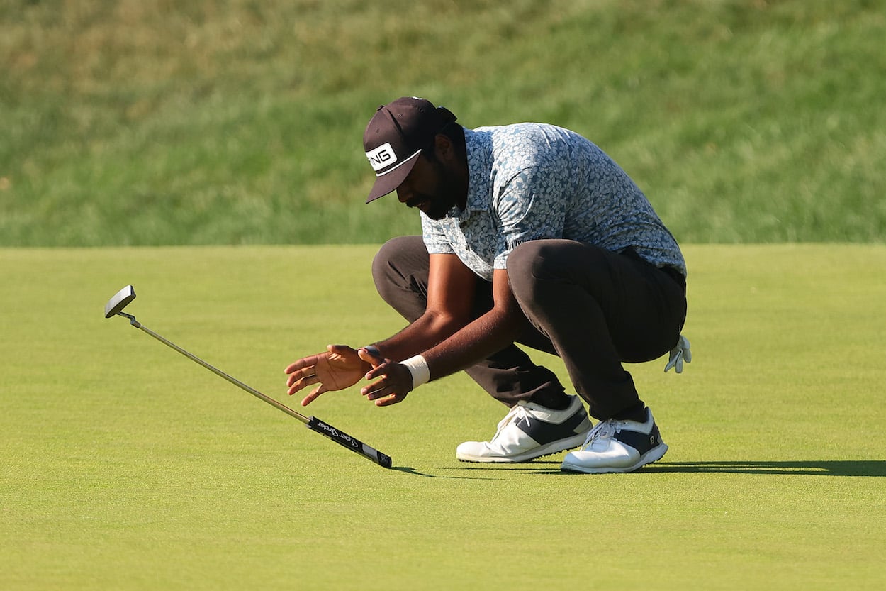 Sahith Theegala reacts after missing a putt.