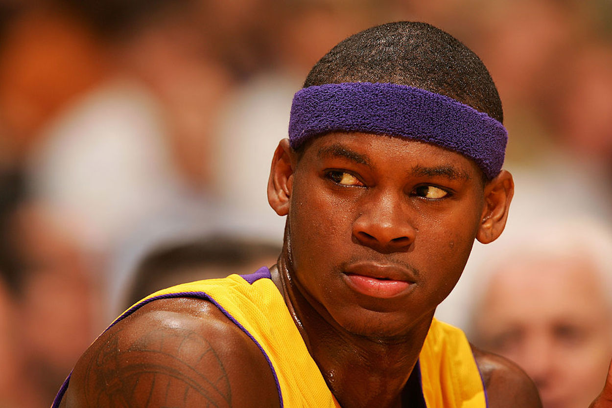Smush Parker sits on the bench as a member of the Los Angeles Lakers.
