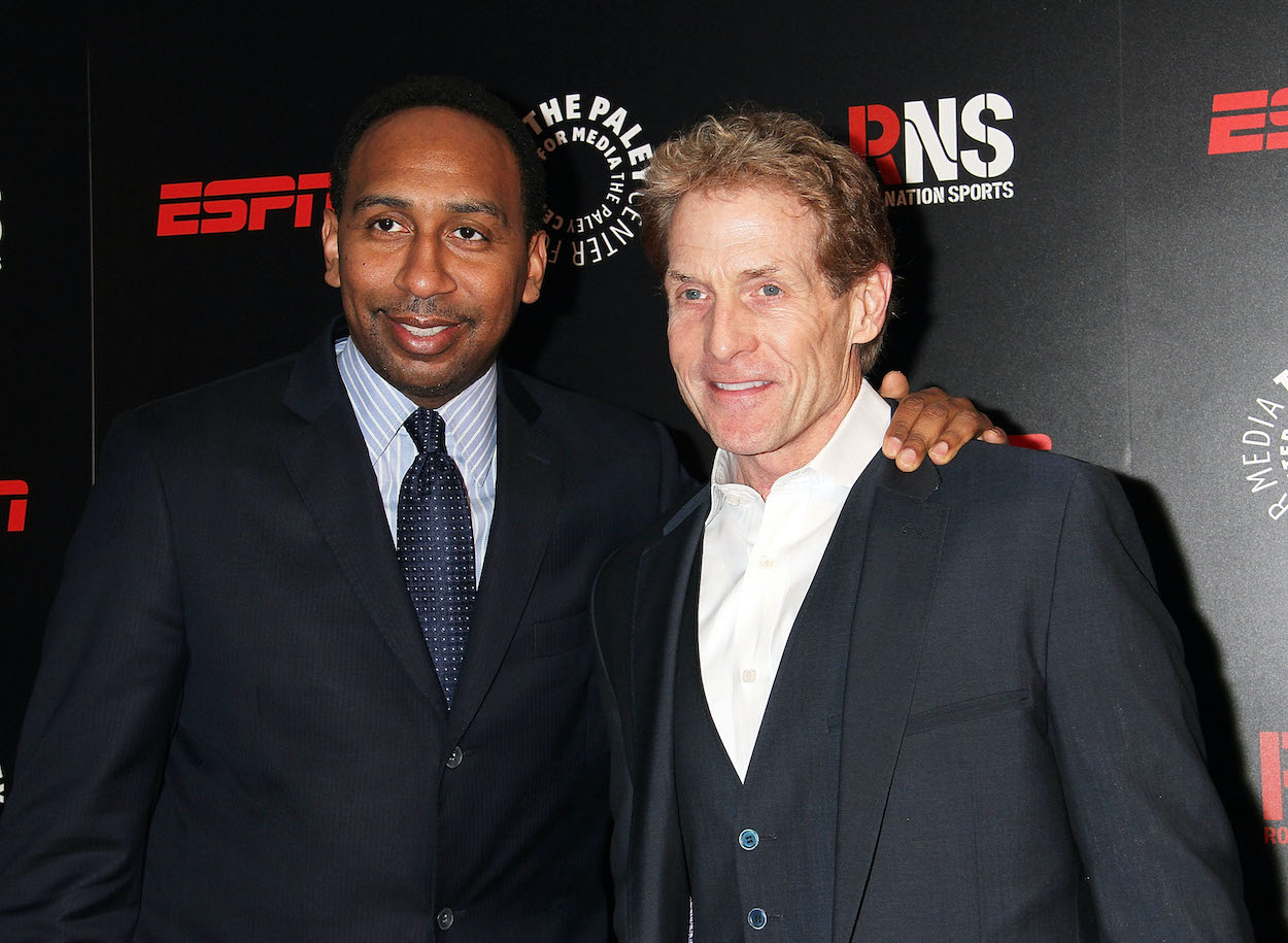 Stephen A. Smith and Skip Bayless pose for a photo.