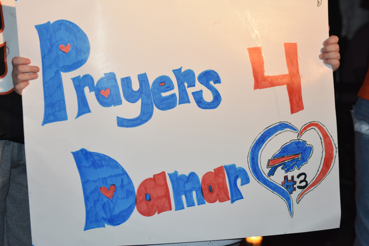 Fans gather outside the UC Medical Center for Buffalo Bills safety Damar Hamlin, who received medical attention after suffering cardiac arrest.