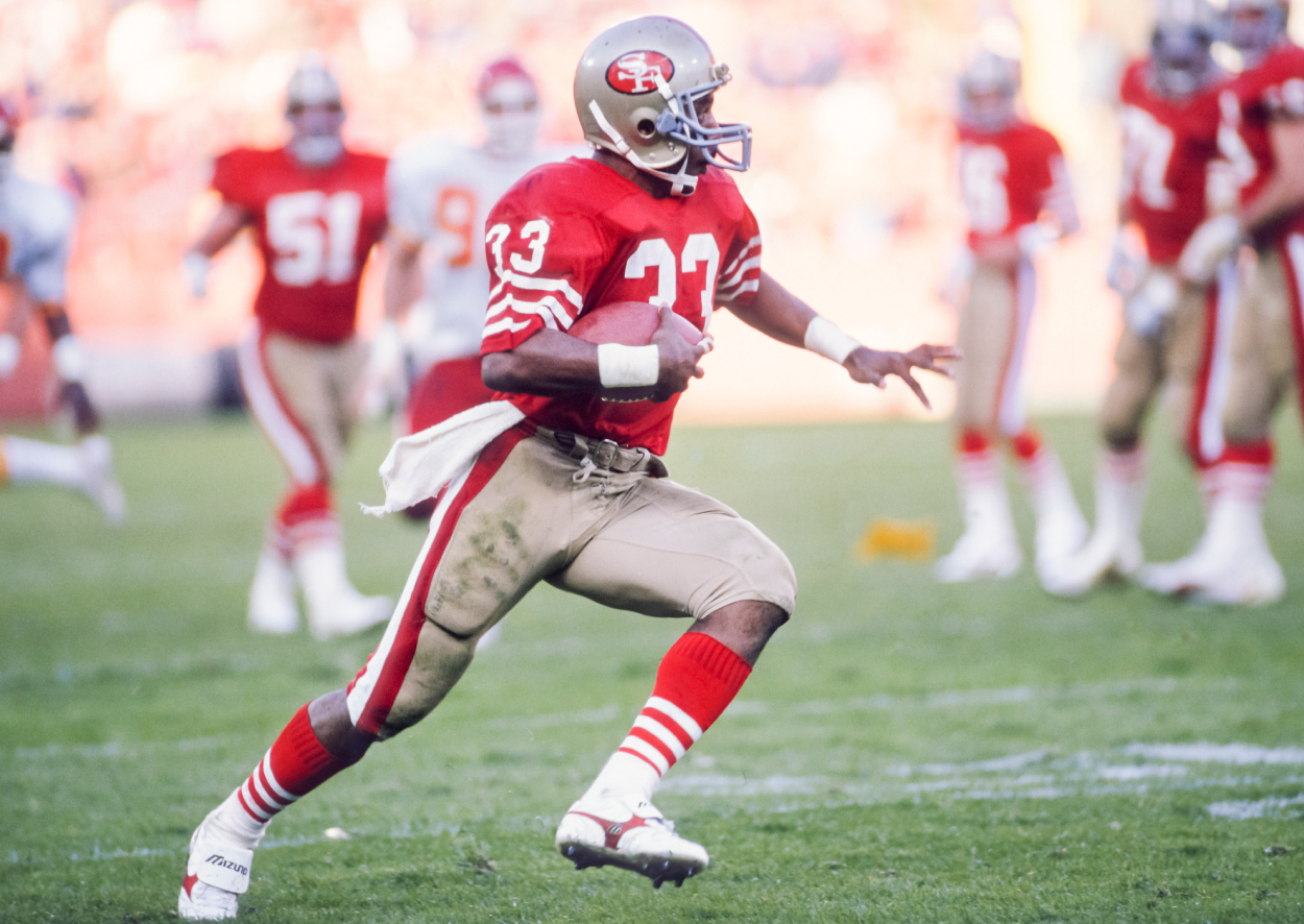 Roger Craig of the San Francisco 49ers makes a run during a National Football League game against the Kansas City Chiefs.