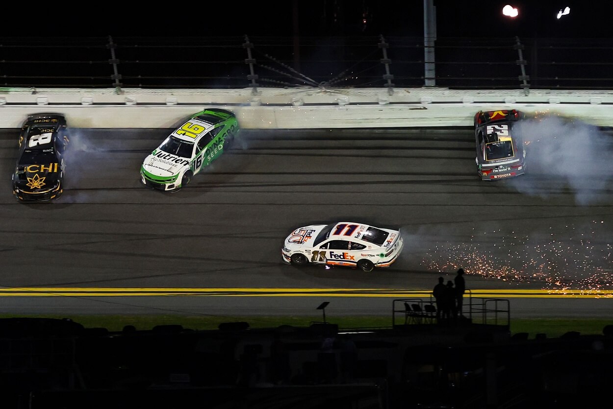 Several cars spin out during the 2023 NASCAR Cup Series Daytona 500