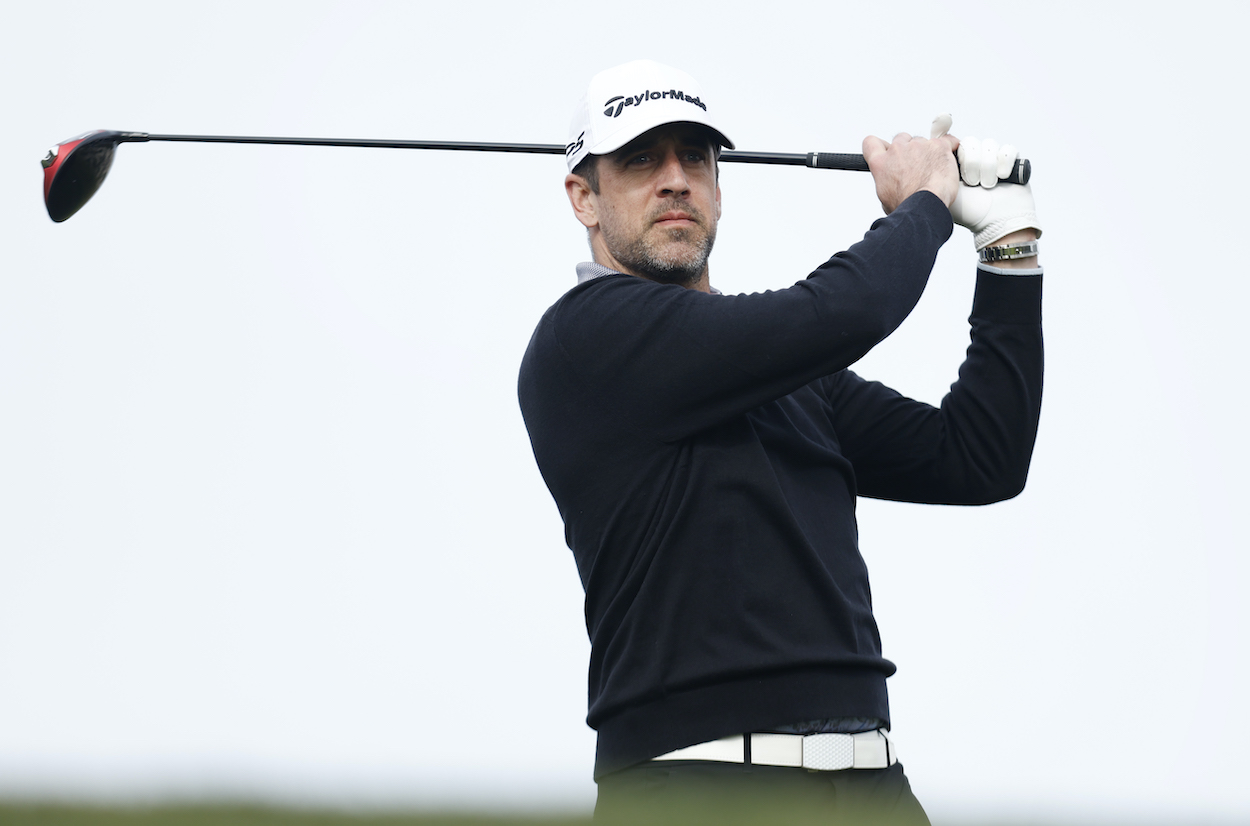 Aaron Rodgers hits a shot during the AT&T Pebble Beach Pro-Am.