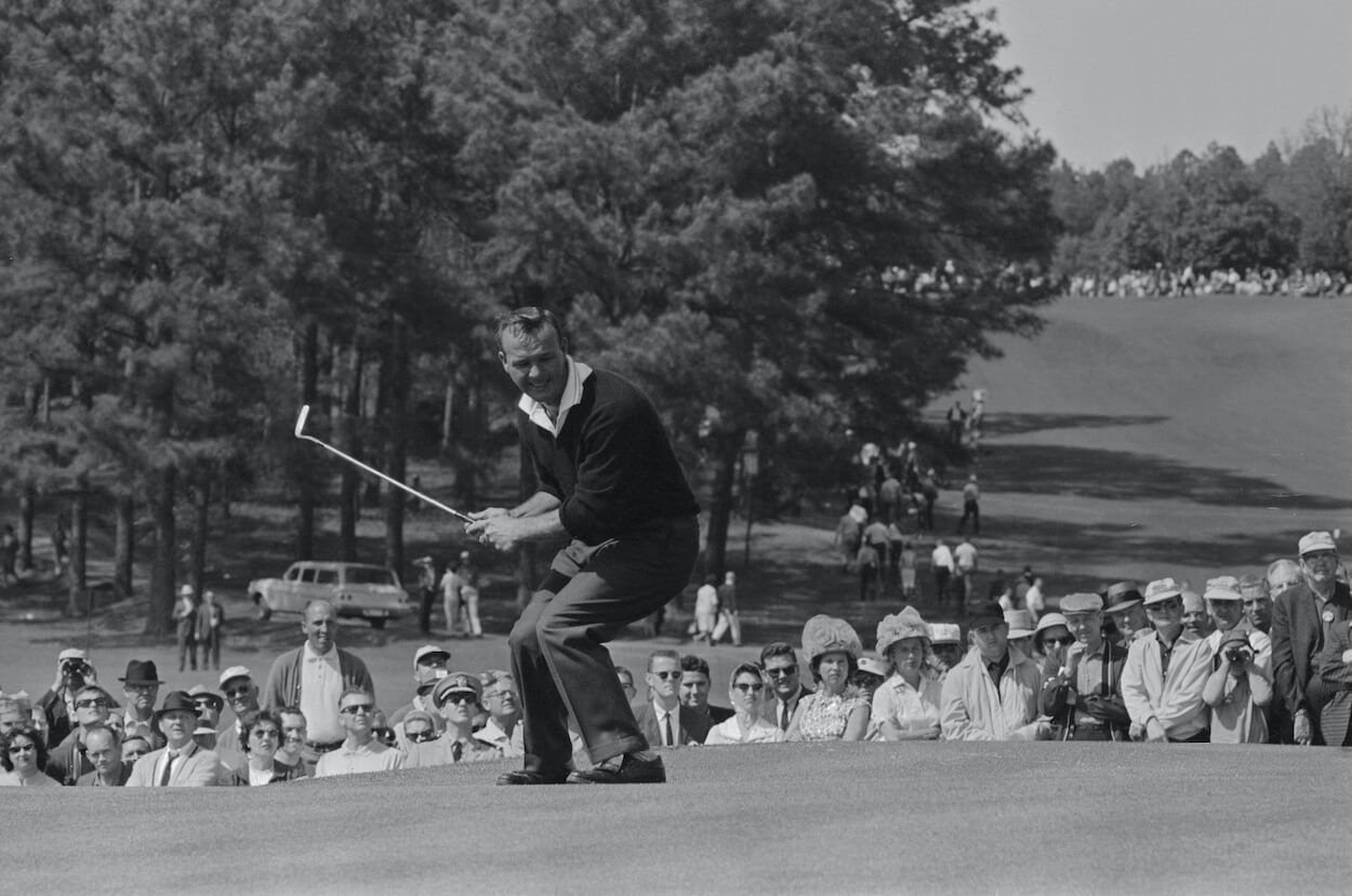 Arnold Palmer misses a putt during the 1962 Masters.