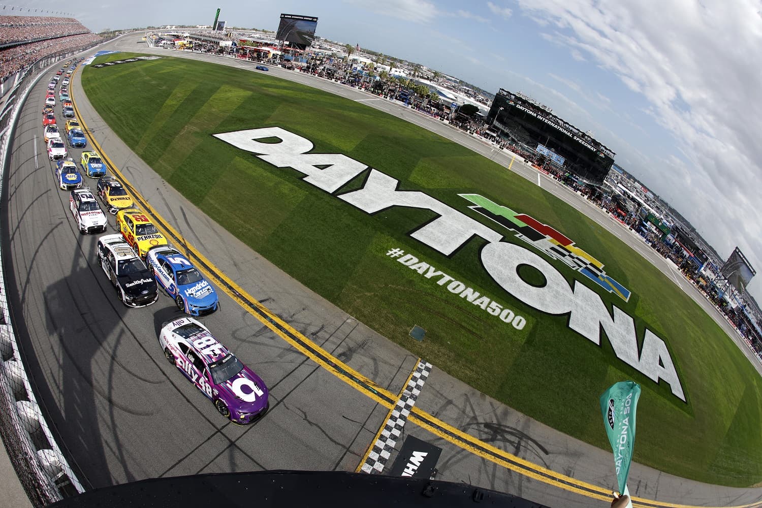 Alex Bowman leads the field to the green flag to start the 65th Daytona 500.