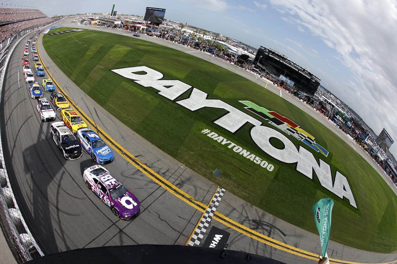 Alex Bowman leads the field to the green flag to start the 65th Daytona 500. | Sean Gardner/Getty Images