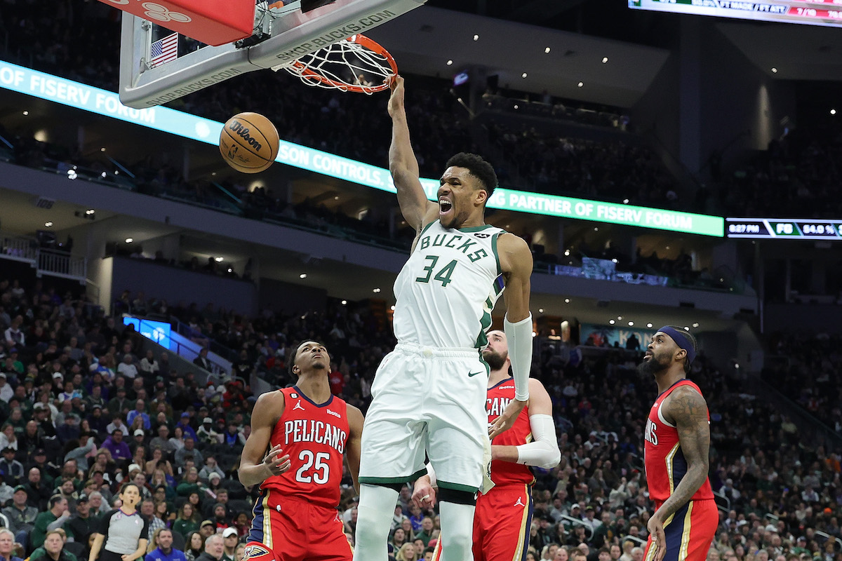 Giannis Antetokounmpo of the Milwaukee Bucks dunks during a game against the New Orleans Pelicans