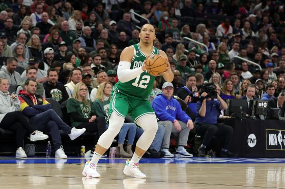 Grant Williams of the Boston Celtics takes a three-point shot .