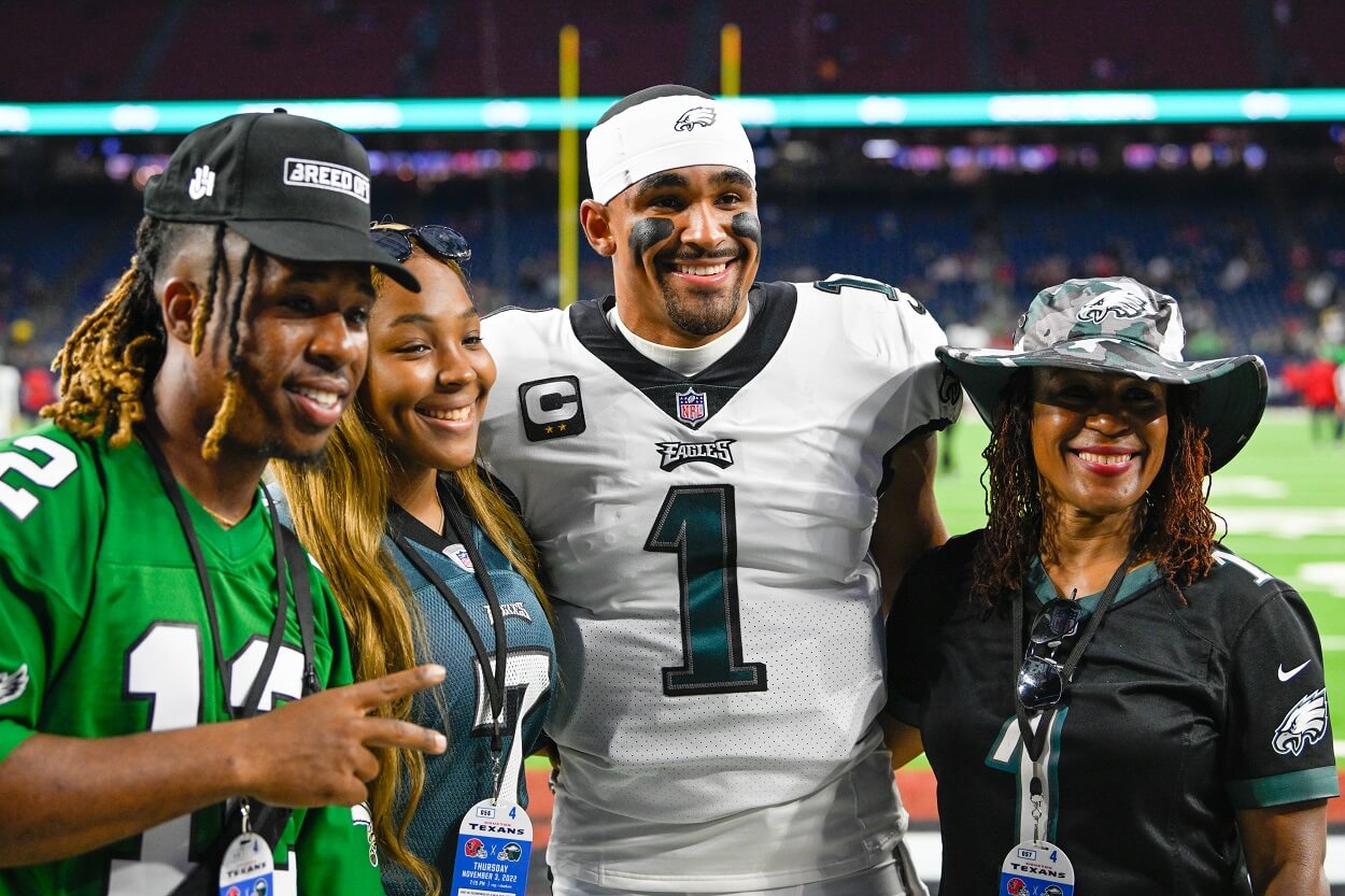 Jalen Hurts with his brother, sister, and mother ahead of an Eagles-Texans matchup in November 2022