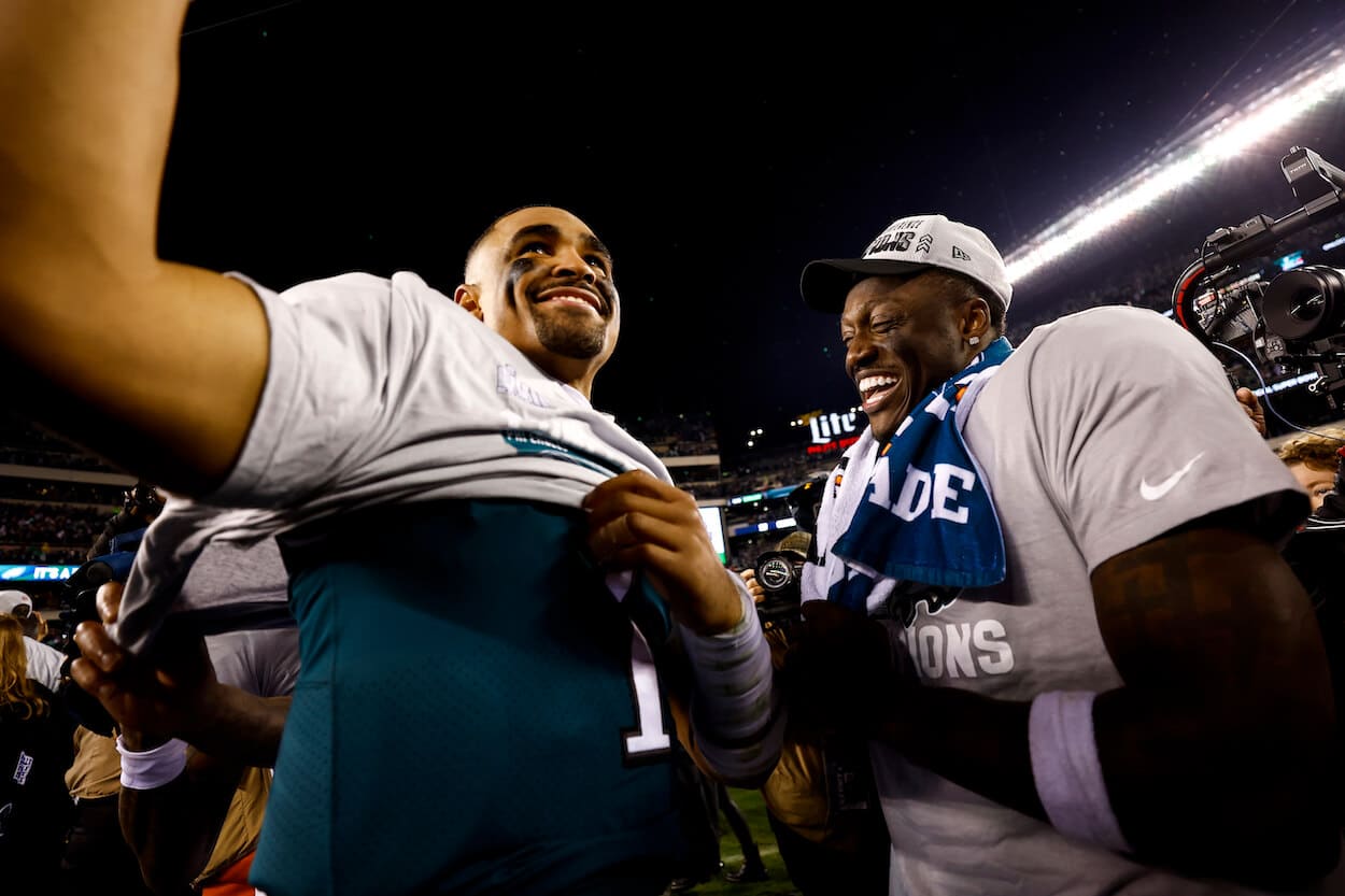 Jalen Hurts and A.J. Brown celebrate on the field.