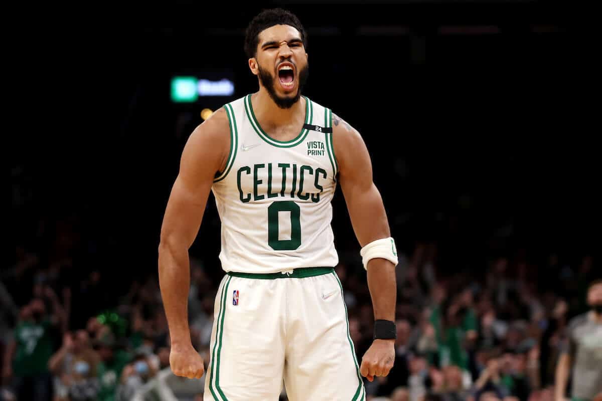Jayson Tatum screams in celebration for the Boston Celtics