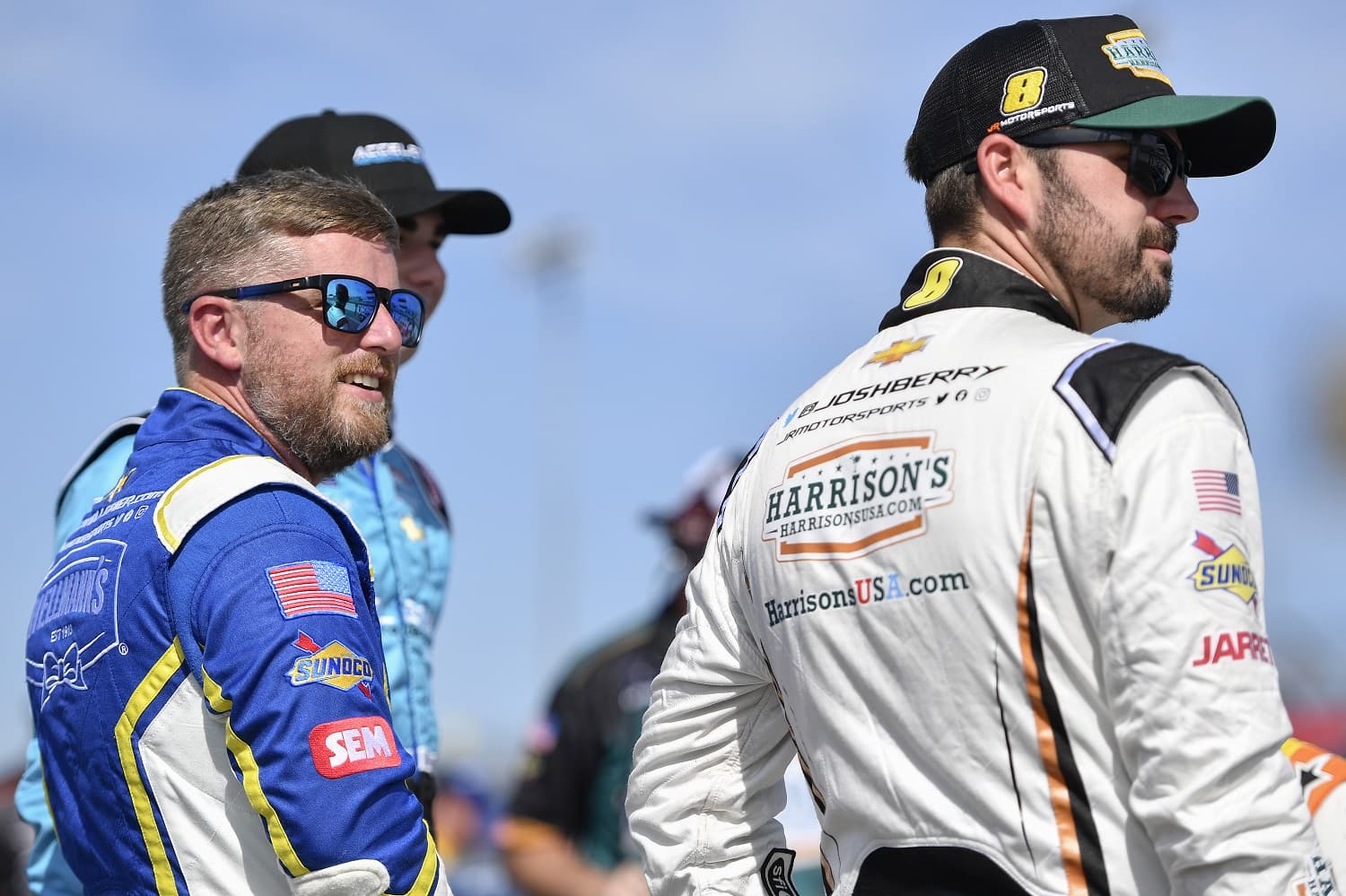 Justin Allgaier and Josh Berry look on during qualifying for the NASCAR Xfinity Series Sport Clips Haircuts VFW Help A Hero 200 at Darlington Raceway on Sept. 3, 2022.