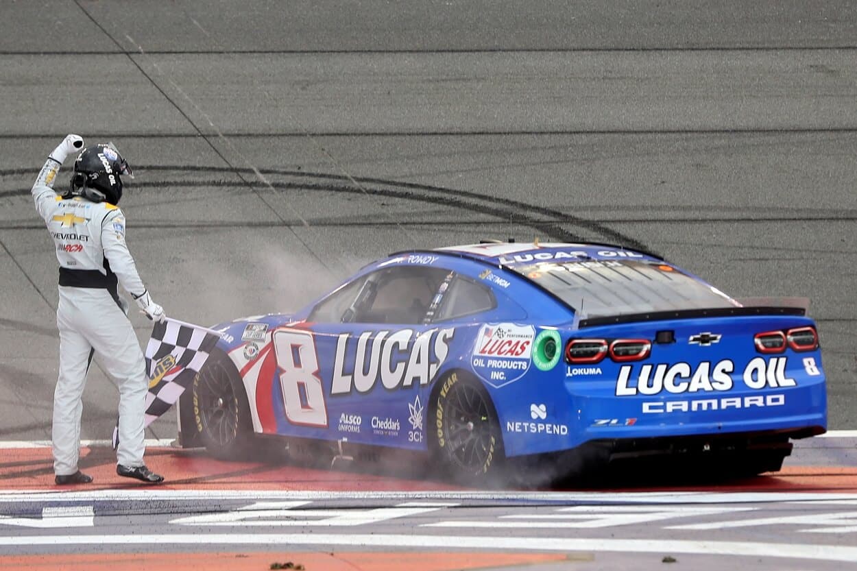 Kyle Busch, driver of the No. 8 Chevrolet, celebrates after winning the 2023 NASCAR Cup Series race at Auto Club Speedway.