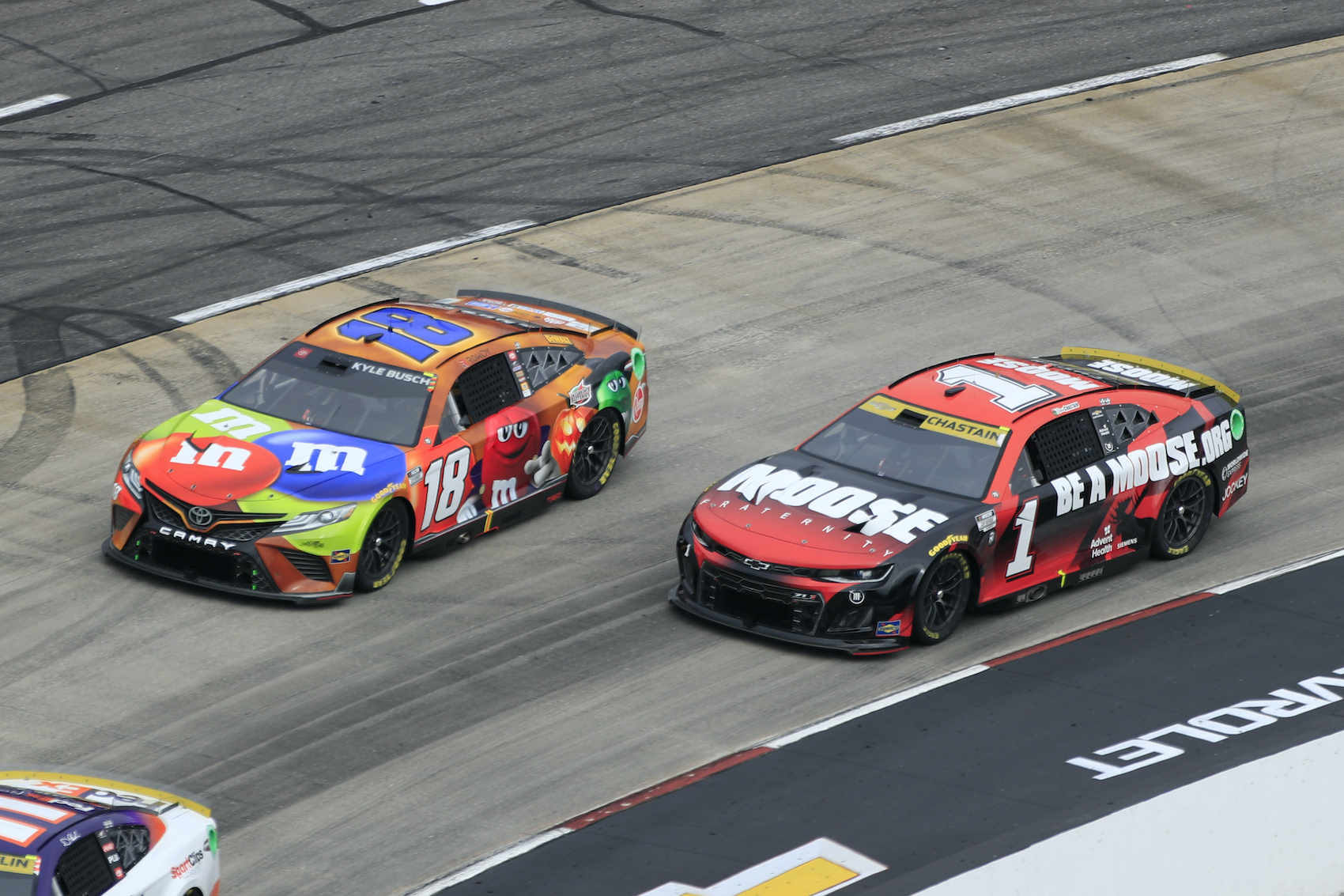 Kyle Busch and Ross Chastain race