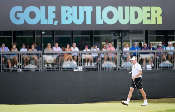 Ian Poulter of LIV Golf walks on the green.