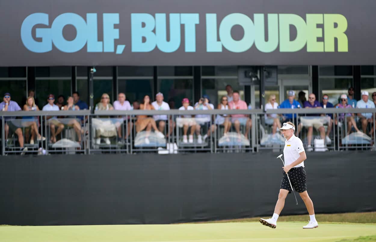 Ian Poulter of LIV Golf walks on the green.