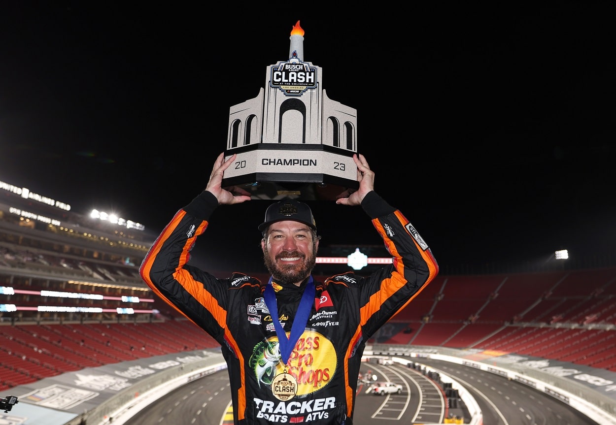 Martin Truex Jr. celebrates his victory at the 2023 NASCAR Clash at the Coliseum