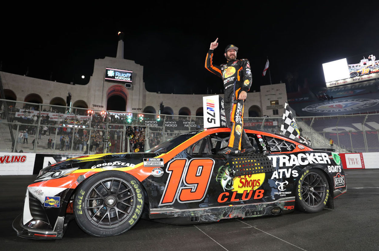 Martin Truex Jr. celebrates his win at NASCAR's Clash at the Coliseum.