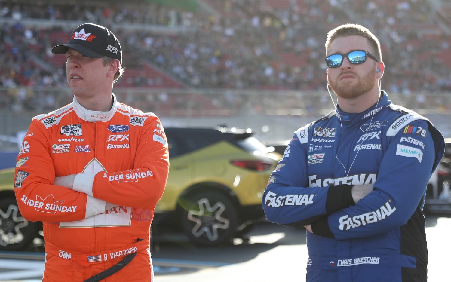 Brad Keselowski and Chris Buescher look on during qualifying heats for the NASCAR Clash at the Coliseum on Feb. 5, 2023.