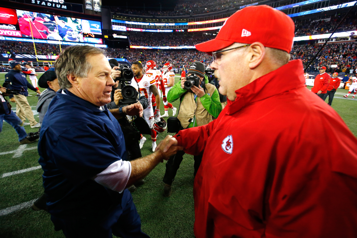 Head coach Bill Belichick of the New England Patriots and head coach Andy Reid of the Kansas City Chiefs shake hands.
