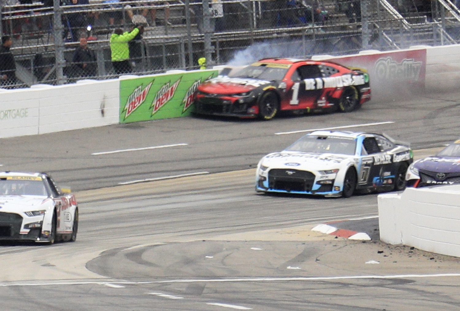 Ross Chastain runs along the wall through Turn 4 on the final lap of the NASCAR Cup Series playoff race at Martinsville on Oct. 30, 2022.