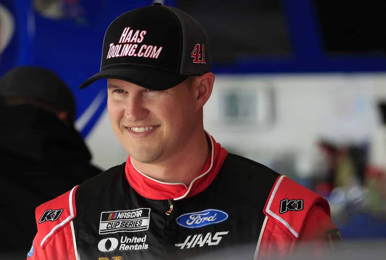 Ryan Preece talks with his crew during practice for the Daytona 500 on Feb. 18, 2023, at Daytona International Speedway.