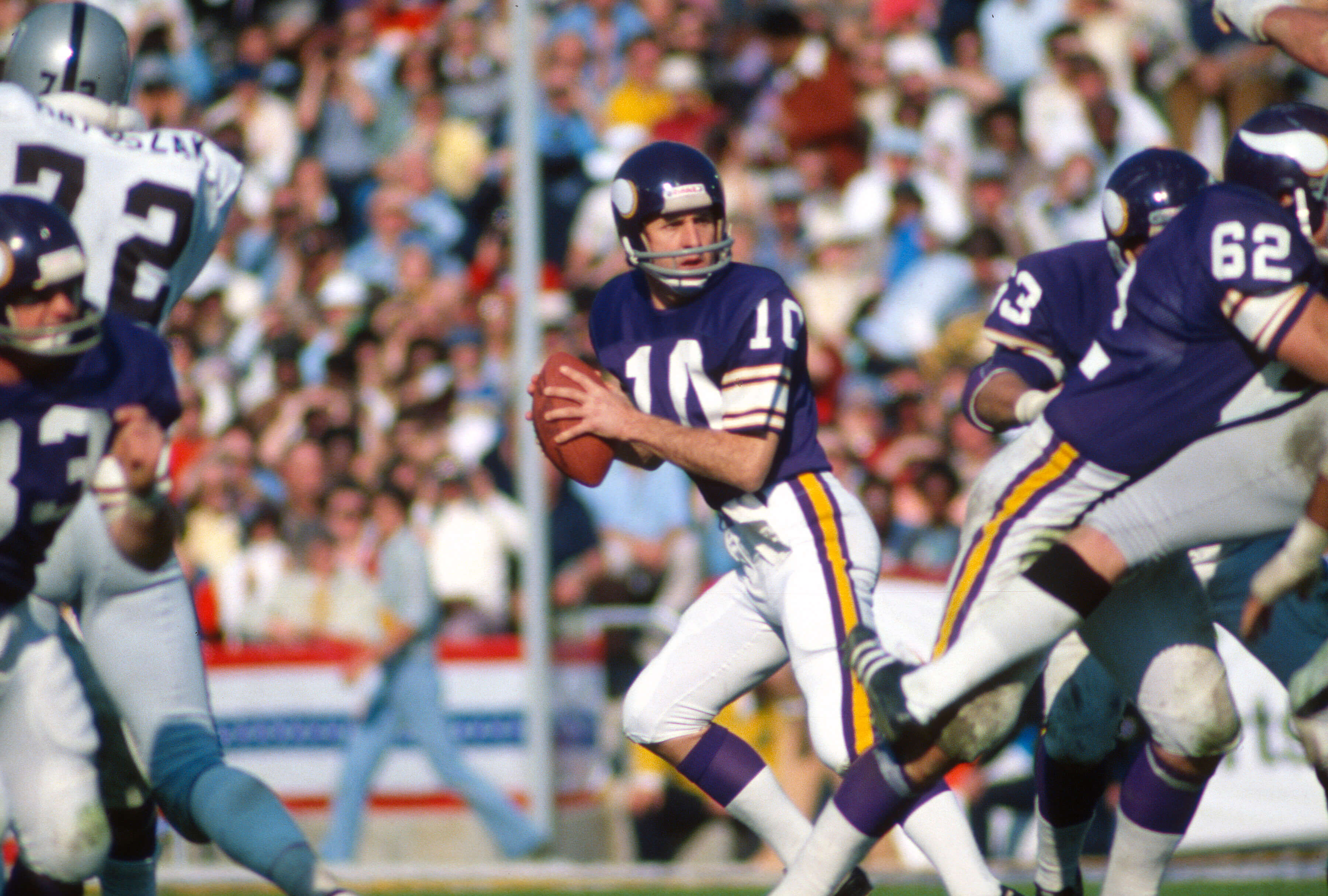 Fran Tarkenton of the Minnesota Vikings drops back to pass.