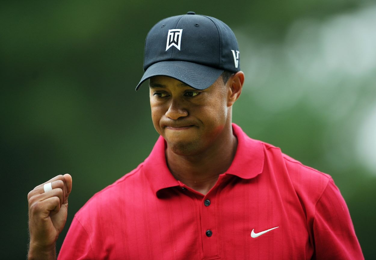 Tiger Woods pumps his fist.