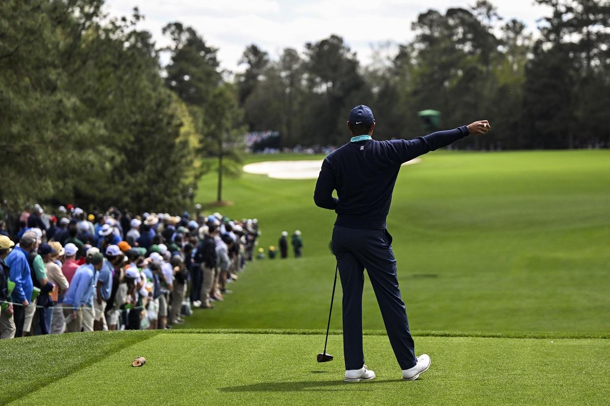 Tiger Woods reacts fore right at The Masters in 2022