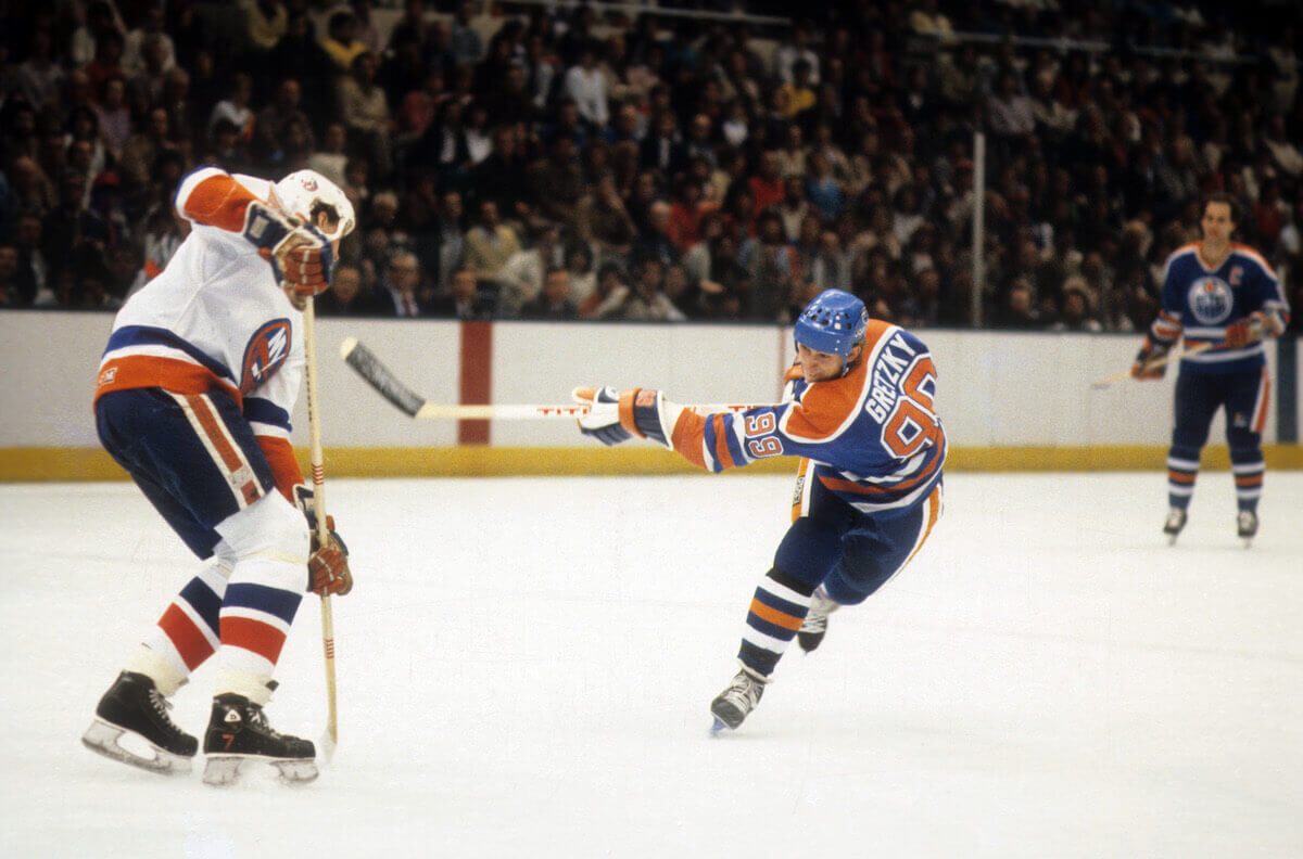 Wayne Gretzky follows through after a shot for the Edmonton Oilers