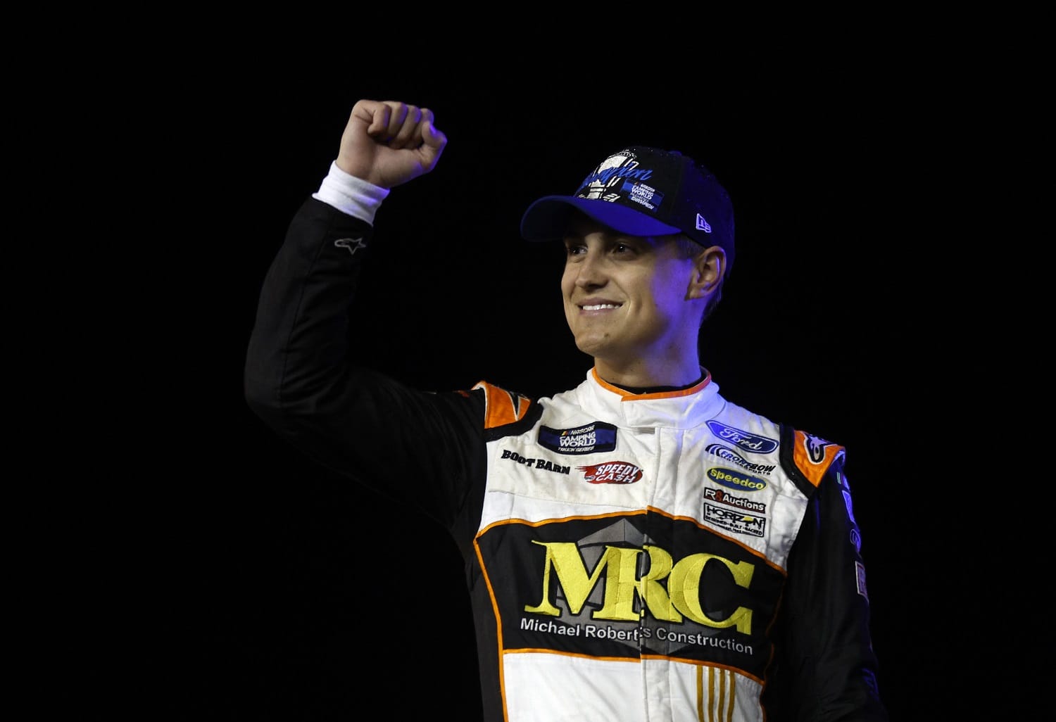 Zane Smith celebrates after winning the 2022 NASCAR Camping World Truck Series Championship at Phoenix Raceway on Nov. 4, 2022.