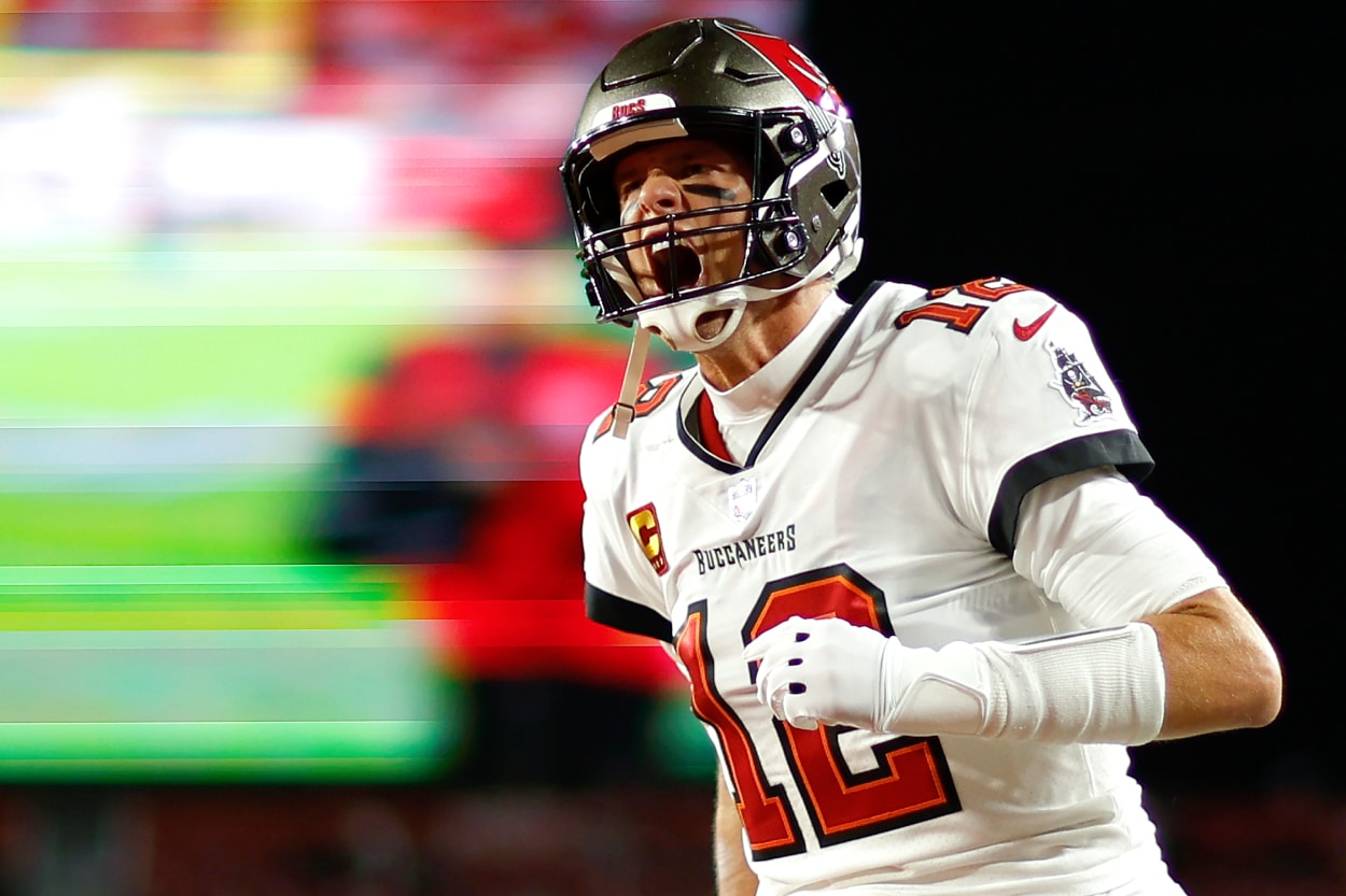 Tom Brady of the Tampa Bay Buccaneers yells as he runs on the field.