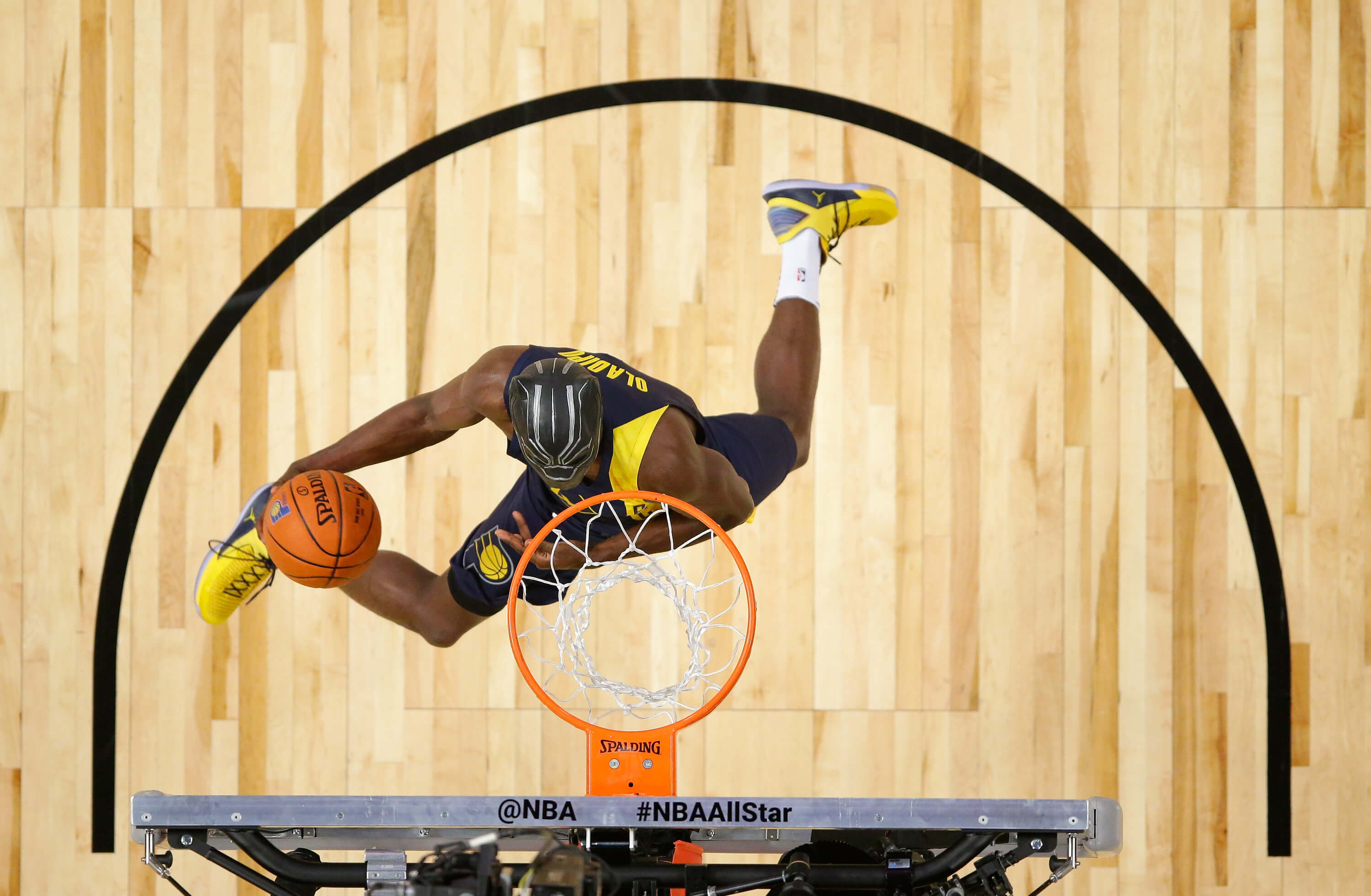 Victor Oladipo of the Indiana Pacers competes in the 2018 Verizon Slam Dunk Contest.