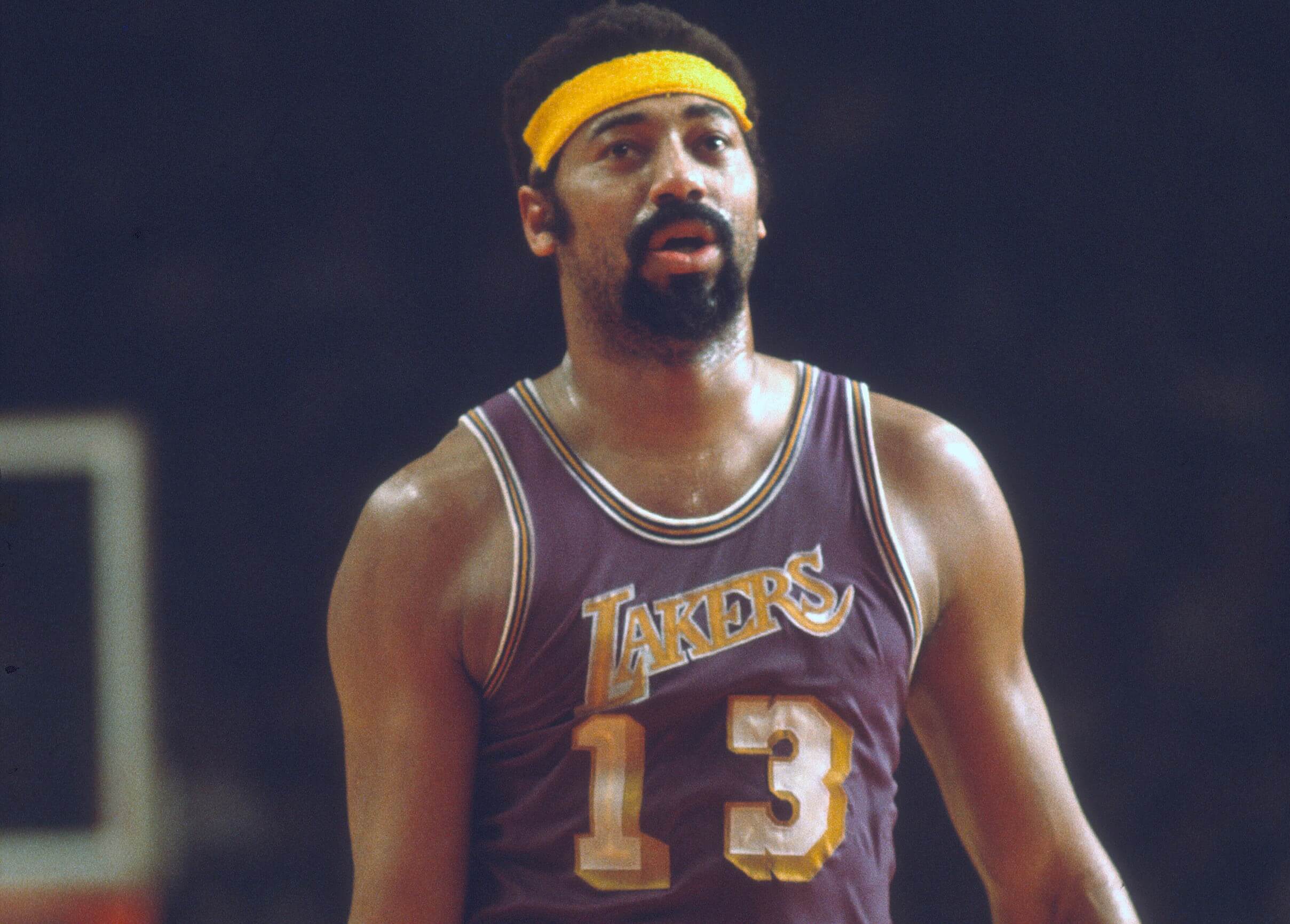 Wilt Chamberlain of the Los Angeles Lakers looks on against the Baltimore Bullets.