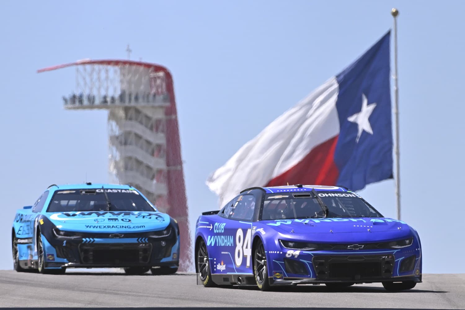 Jimmie Johnson and Ross Chastain drive during practice for the NASCAR Cup Series EchoPark Automotive Grand Prix at Circuit of The Americas on March 24, 2023.