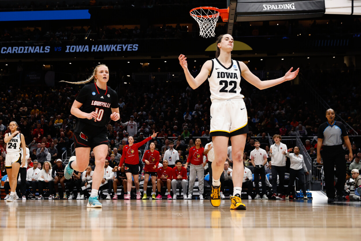 Caitlin Clark of the Iowa Hawkeyes reacts during the second quarter of the game against the Louisville Cardinals.