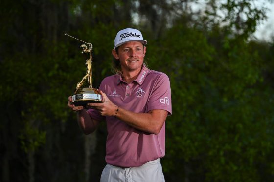 Cameron Smith poses with the Players Championship trophy.