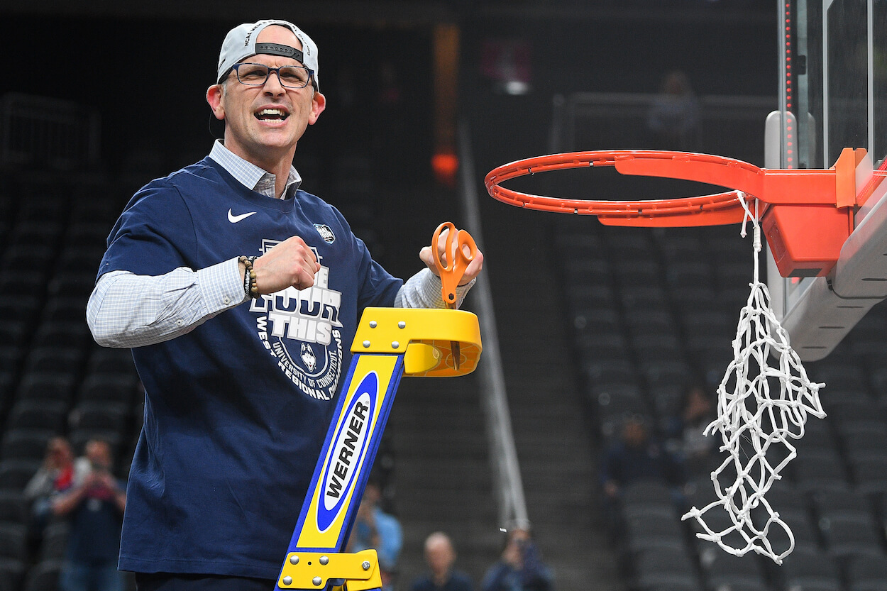 Dan Hurley cuts down the net after advancing to the Final Four.