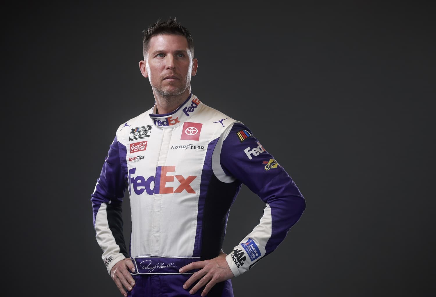 NASCAR driver Denny Hamlin poses for a photo during NASCAR Production Days at Charlotte Convention Center on Jan. 18, 2023. | Jared C. Tilton/Getty Images